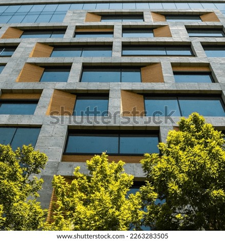 Building facade, combination of concrete and wood, modern design, Concrete panels and wooden pieces