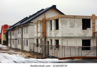 Building house made of bricks - Shutterstock ID 2118198719