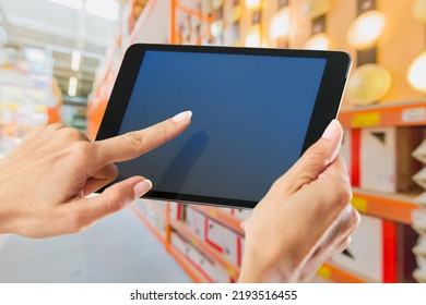 Building Inventory Management Concept. Man Using Digital Tablet, Showing Warehouse Software Management Dashboard On Warehouse