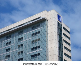 Building With Large H Sign For Hospital