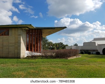 building with large window and large eaves