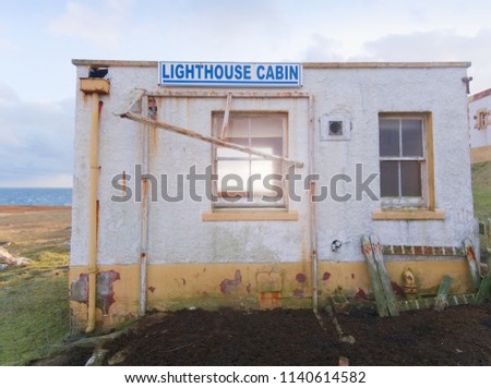 Building of lighthouse on Neist Point. Inside of abandoned building. Popular Neist Point.