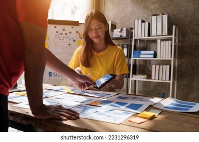Building and managing a UX team working at desk, UX designers participate in all phases of the UX design. - Shutterstock ID 2231296319
