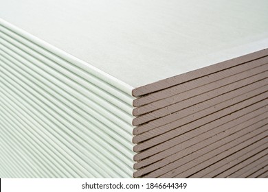 Building Material. Drywall Sheets Are Stacked On Top Of Each Other.