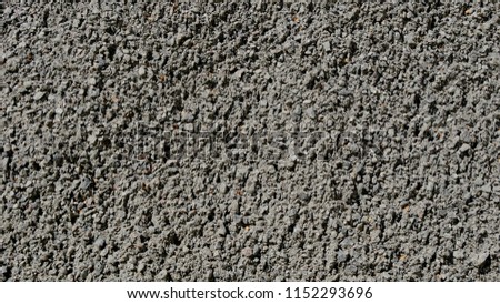 Building materials and fettling background, light crushed stone. Background texture of stone, crushed stone and brick