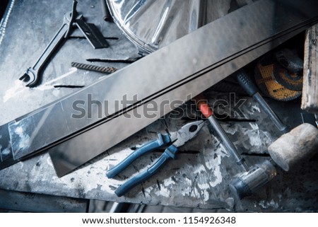 Building and measuring tools for metal processing and circles.