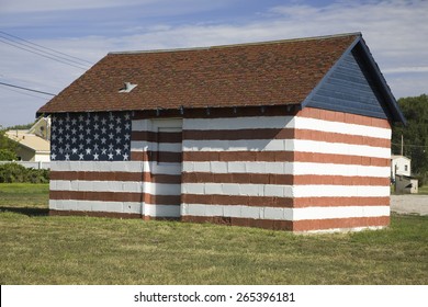 Building with mural painting of the American flag along old Lincoln Highway, US 30, Ogallala, Nebraska