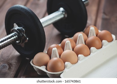 Building A Muscle Mass: Weightlifting And Protein Food, Horizontal Shot