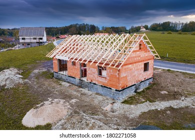 Building Of The New Family House. Rough Construction With Trusses