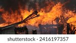 building on fire burning down