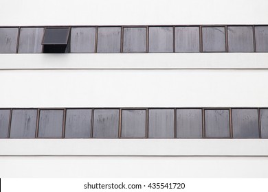 A building with one window opened 