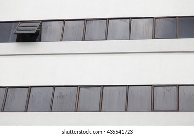 A building with one window opened 