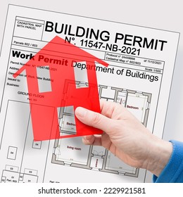 Building Permit concept with imaginary building approvation and residential home icon - Shutterstock ID 2229921581