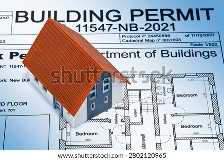 Building Permit concept with imaginary building approvation and residential home model