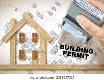 BUILDING PERMIT concept with maginary General Urban Plan and cadastral map with stamp and wooden home icon - Powered by Shutterstock