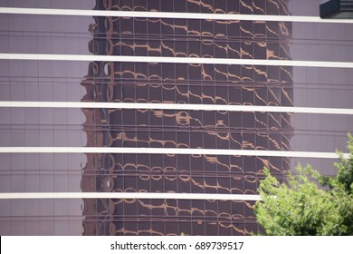 building reflected in another building