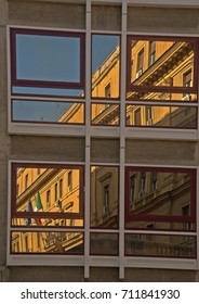 building reflected in window