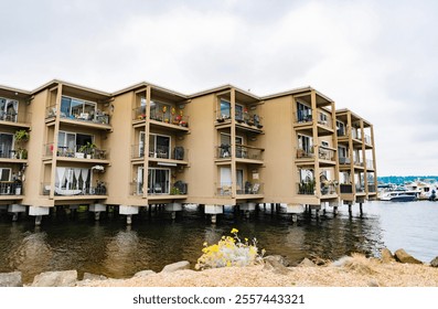 Building with residential apartment at the river. Harbor residential apartment building. modern architecture. Residential waterfront apartment building. Waterfront architecture - Powered by Shutterstock