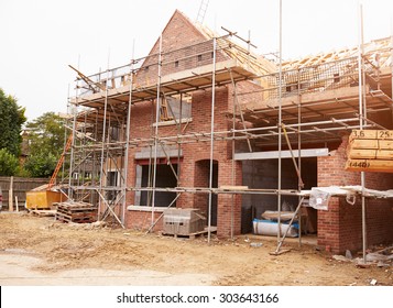 Building Site With House Under Construction