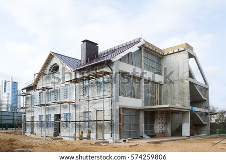 Building Site With House Under Construction