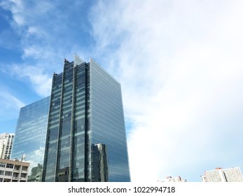 Building and the sky with clouds.