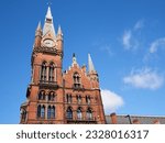 Building of St. Pancras International Railway Station, with a clock tower. Camden, London, England, UK