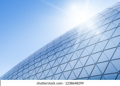 Building structures aluminum triangle geometry on facade of modern urban architecture - Powered by Shutterstock