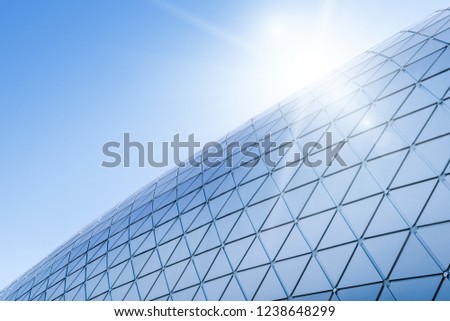 Building structures aluminum triangle geometry on facade of modern urban architecture