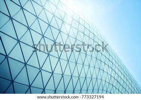 Building structures aluminum triangle geometry on facade of modern urban architecture