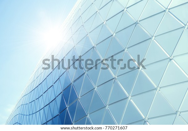 Building structures aluminum triangle\
geometry on facade of modern urban\
architecture