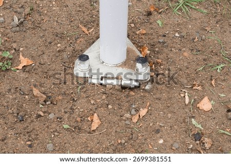 Building structures. Flagpole mast support with ground anchorage
