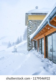 A building surrounded by snow at La Thuile village, Aosta Valley Province, Italy
