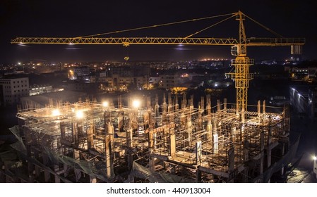 Building Under Construction With Crane