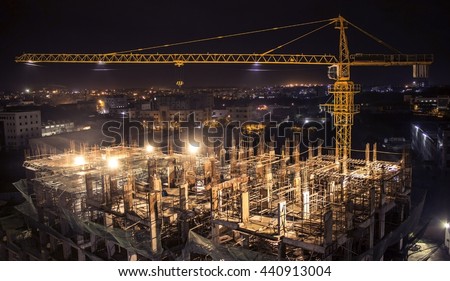 Building under construction with crane