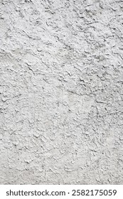 Building wall with roughcast plaster background with grainy effect surface