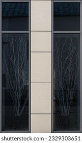 building with windows and trees inside