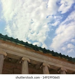 Buildings, architecture, looking up and clouds.