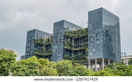 Buildings of the future with trees on each floor - Modern architecture.