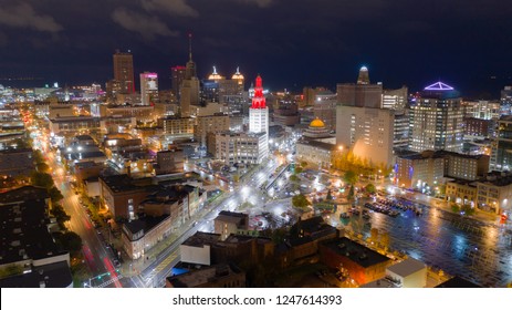 The buildings are illuminated before sunrise in the urban core of Buffalo New York