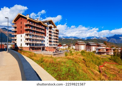 Buildings in Rosa Plateau mountain village. Rose Plateau and Roza Khutor are alpine ski resorts near Krasnaya Polyana town in Sochi region, Russia. - Powered by Shutterstock