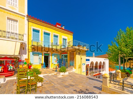 buildings and shops located around the main square of Chora, the capital of Andros island in Greece