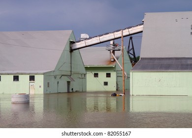 Buildings sunken in overflowing river