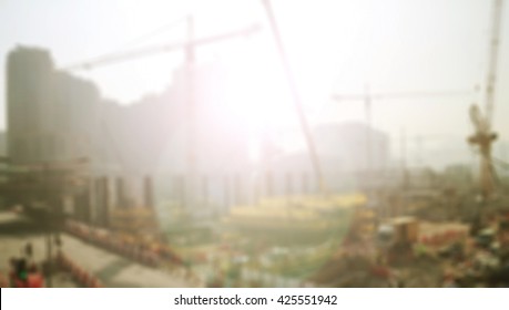 Buildings Under Construction With Sunset Blurred Background.