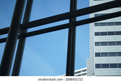 Buildings and window frames on a sunny blue sky day                               - Shutterstock ID 2008501721