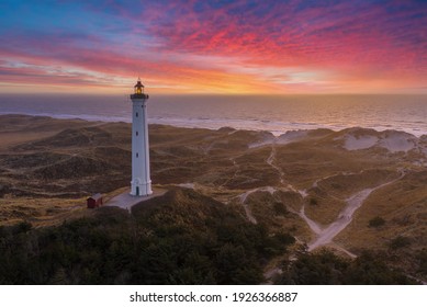 Built in 1906, the 38 meter tall Lyngvig Fyr Lighthouse on the Danish North Sea coast serves as a beautiful tourist attraction amongst the Danish Sand Dunes.