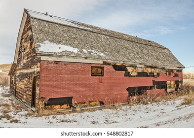 Built To Look Like A Barn Due To The Agricultural Area It Is In, This Community Hall Has Been Patched In Several Places.  It Is The Last Remaining Building In A Small, Rural Montana Town