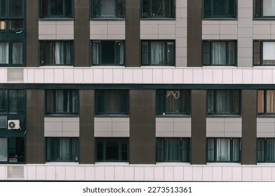 Built structure with windows. Modern facade of apartment building