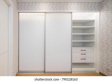 Built-in Sliding Wardrobe, White Color.