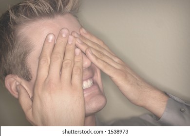 Buisness Man Covering Eyes