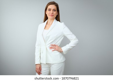 Buisness Woman In White Suit Standing Near To Copy Spase. Isolated Female Portrait.